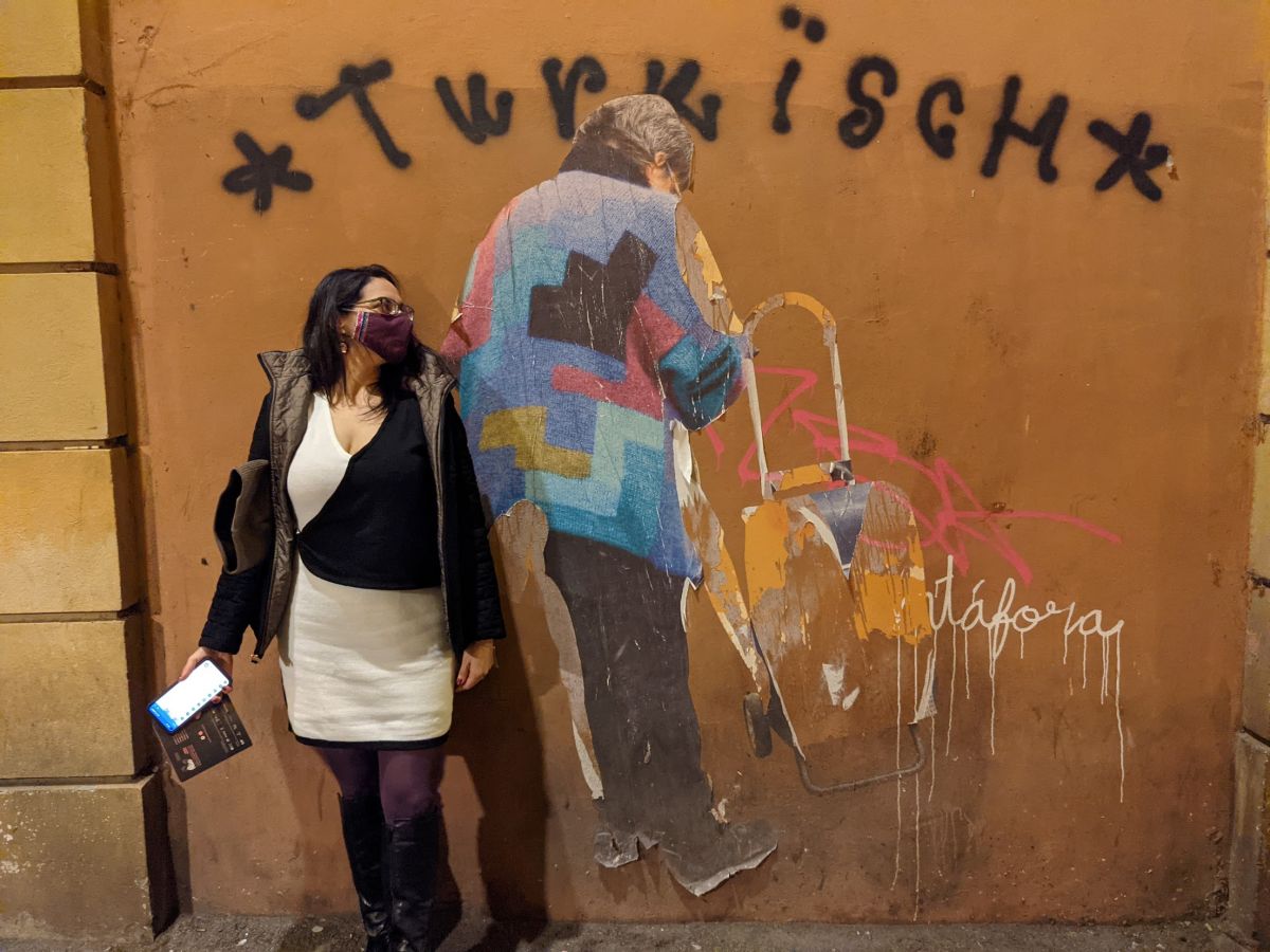 Teresa in front of some street art