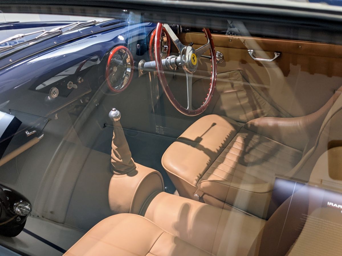Interior of an old Ferrari with steering wheel on the right