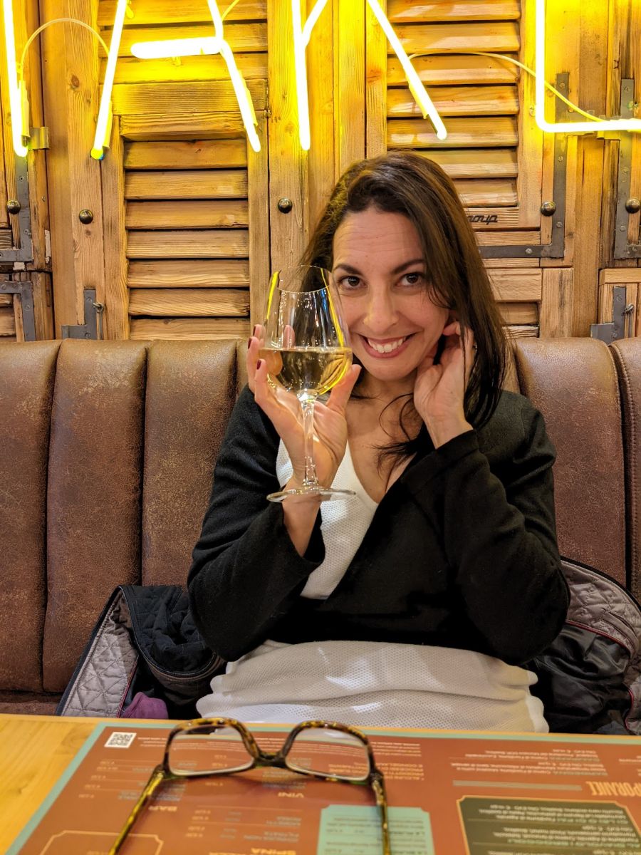 Teresa enjoying a glass of wine at Fra Diavolo