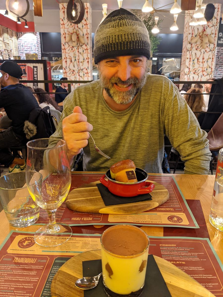 Me, enjoying my rum baba (as if I needed even more alcohol!)