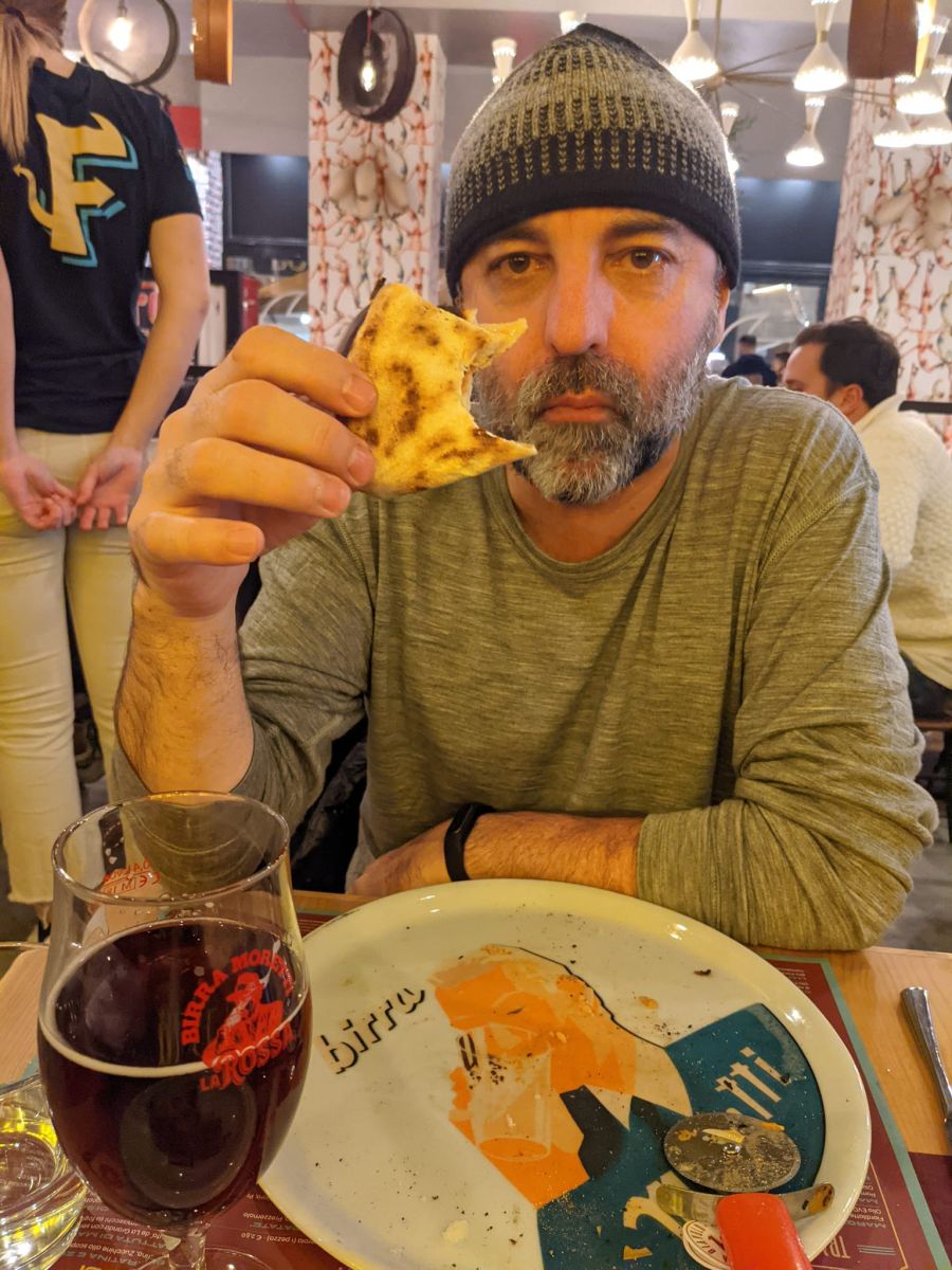 Me, enjoying pizza and wine at Fra Diavolo