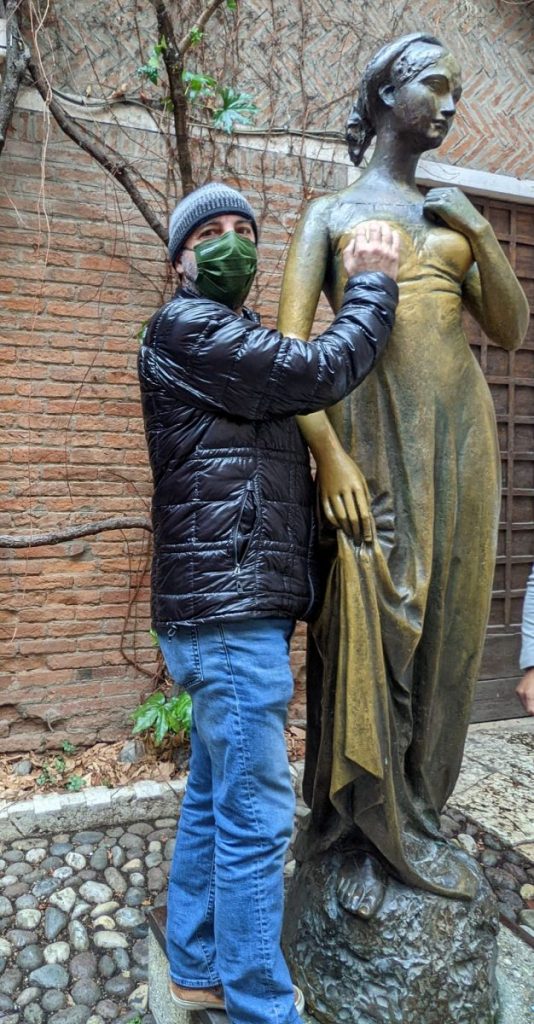 Me, touching the statue of Juliet for good luck.