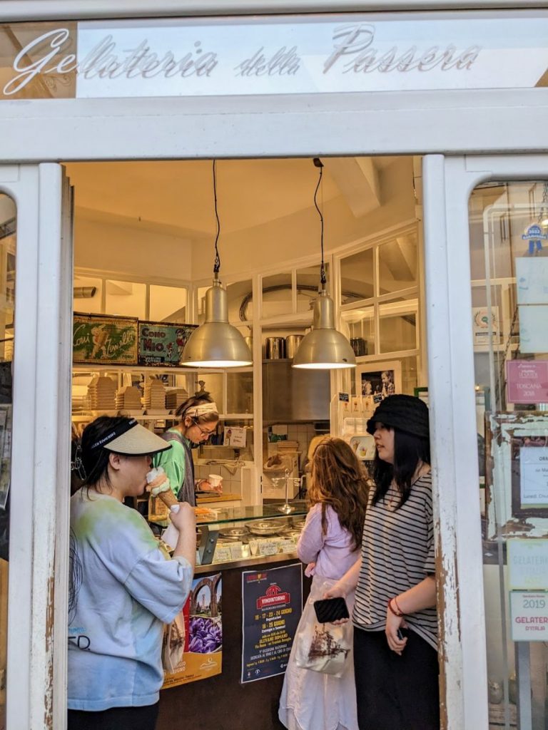 Customers inside the small but wonderful Gelateria della Passera