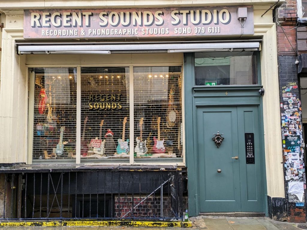 Photo of the front of Regent Sounds music store, with the old/original Regent Sounds Studio sign still there.