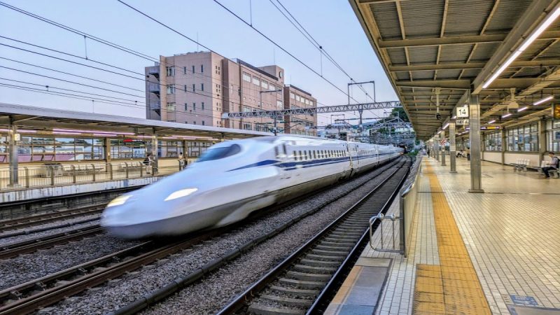 A Bullet Train speeding through the station