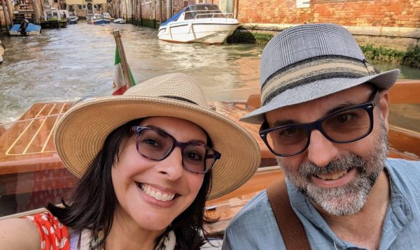Photo of Teresa and Tony in a water taxi in Venice, Italy